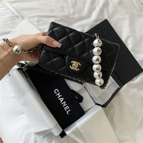 chanel boy bag small gold chain|chanel bag with pearl chain.